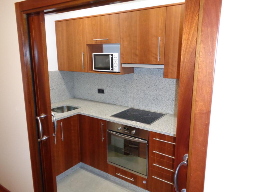 Apartamentos Turisticos Javier لوغو المظهر الخارجي الصورة